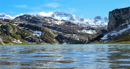 a lake in the snowy mountains