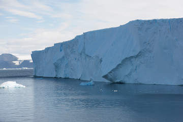 Antarctica landscape with icebergs and on a cloudy winter day