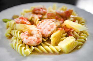 Seafood pasta in sweet and sour sauce