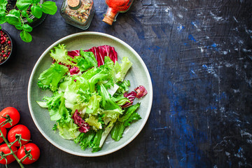 Healthy salad, leaves mix salad (mix micro greens, vegetable snack). food background, copy space for text keto or paleo diet 