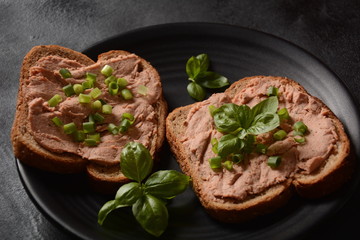 Chicken or goose liver pate sandwiches on a plate