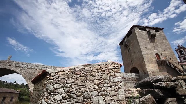 Wide and below shot of Roman Bridge in Ucanha, Portugal