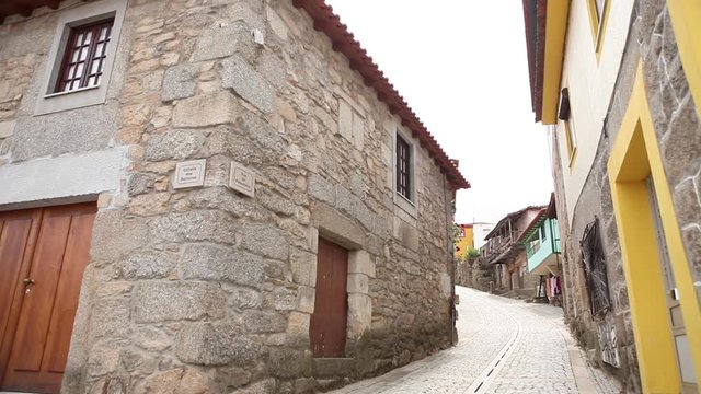 Tradicional Ucanha street with two houses facade in Portugal
