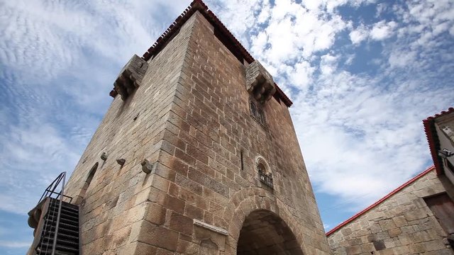 Tilt shot of Stone Castle tower in Ucanha in Portugal
