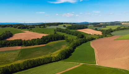 Fototapeta na wymiar Agricultural fields from above - wonderful nature - aerial view by drone