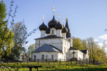 temple Church on the hill through the trees