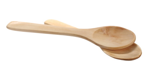 Pair of empty wooden spoons isolated on white background with clipping path