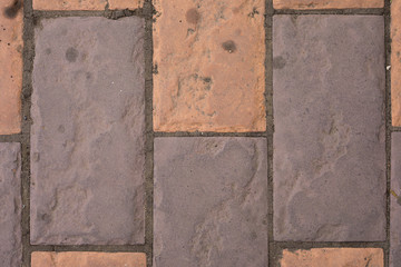 brown rectangular tiled road, closeup top view