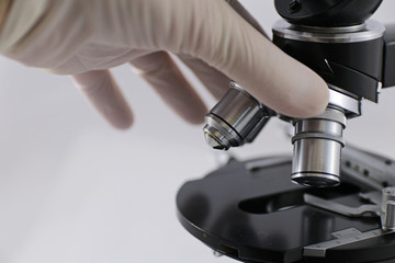 Microscope with metal lenses in a research laboratory. Coronavirus vaccine development.