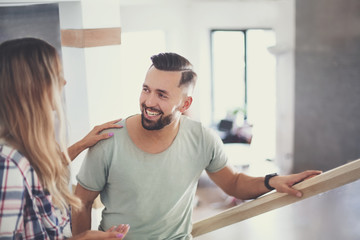 Obraz premium close up. young couple walking up the stairs