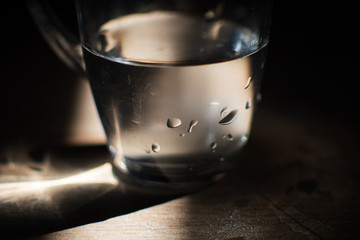 background photo A glass of water with light and shadow abstract beautiful vivid fresh thirsty