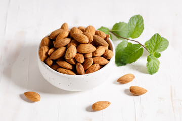 Fresh Almond nuts in a ceramics bowl