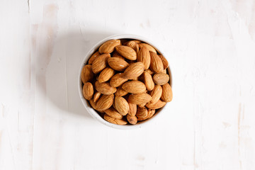 Fresh Almond nuts in a ceramics bowl