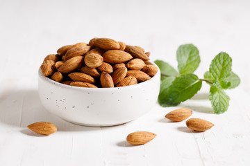 Fresh Almond nuts in a ceramics bowl