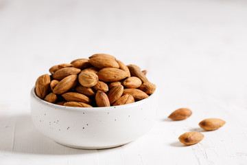 Fresh Almond nuts in a ceramics bowl