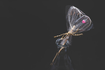 Diet curly lollipops. Transparent and with bright elements. On a stick.