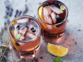 alcoholic or non-alcoholic blueberry cocktail with lavender gin and tequila or blueberry Mojito