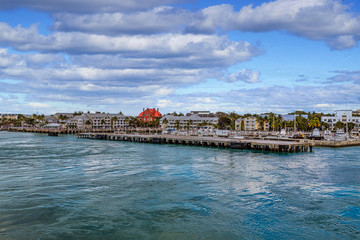 Fototapeta na wymiar Dock of Key West from Sea under clouds