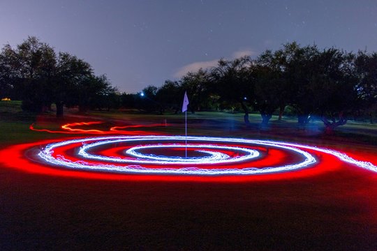 Light Painting On Golf Course At Night