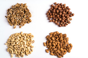 Top view collection of nuts for health, fitness and vitality.