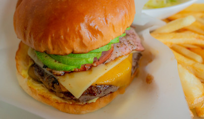 avocado, bacon and cheese hamburger