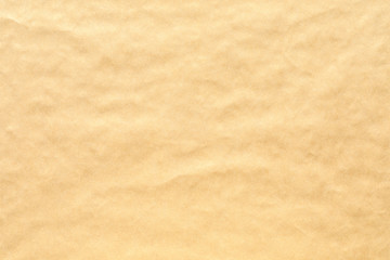 Obraz premium Crumpled brown paper background texture