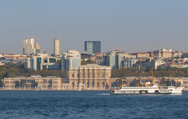 Obraz premium Istanbul, Turkey - built in 1843, and main administrative center of the Ottoman Empire, the Dolmabahçe Palace is a major tourist attraction. Here in particular its facade