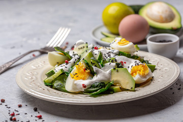 Healthy salad of green vegetables and eggs.