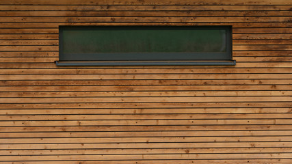 Obraz na płótnie Canvas modern wooden cabin with a window