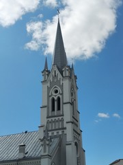 Fototapeta premium The most elegant architecture, blue sky, old churches in Europe