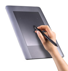 Hand holding digital graphic pen and drawing graphic tablet isolated on white