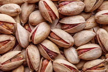 Pistachios texture and background . Tasty pistachios as background,as pistachios texture.Concept of nuts. flat lay
