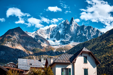 Fototapeta na wymiar Mountain landscape. Buildings in the Chamonix Valley, Alps, France.