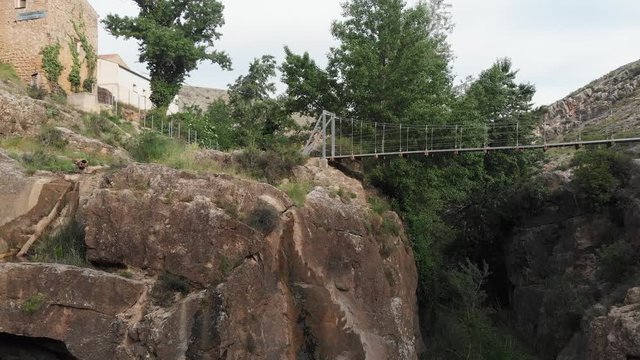 Suspension bridge, Almonacid de la Cuba, Zaragoza, aerial view drom 4K