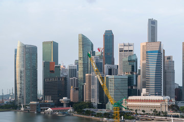 Fototapeta na wymiar Picturesque panoramic view of Singapore city at day time. Financial and trading center hub in Asia region. Concept of success. Modern buildings in high-tech world.