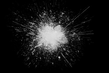 Freeze motion of white powder exploding shatter splatter