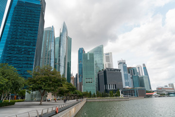 Obraz premium Picturesque panoramic view of Singapore city at day time. Financial and trading center hub in Asia region. Concept of success. Modern buildings in high-tech world.