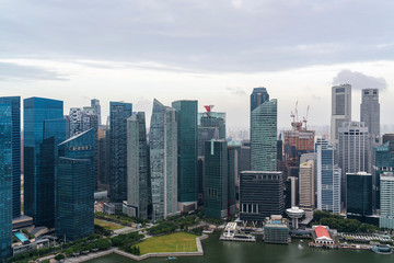 Plakat Picturesque panoramic view of Singapore city at day time. Financial and trading center hub in Asia region. Concept of success. Modern buildings in high-tech world.