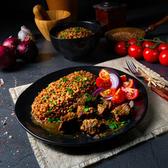 Buckwheat groats baked in the oven with beef goulash