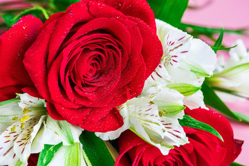 Nice bouquet red roses in celebration concept close up.