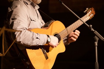 man playing guitar