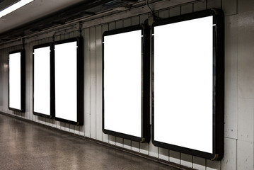 Many advertising displays in a row