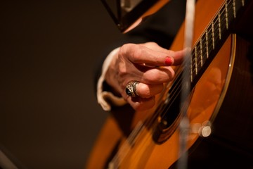 woman playing guitar