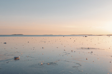 Sunset on frozen sea