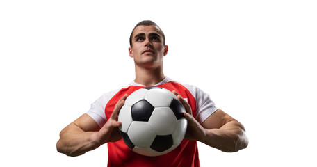 Photo of a soccer player who holds the ball isolated on white. Stadium and crowd made in 3D.