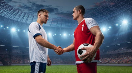 Two football players are shaking hands. They wear sportswear without a brand. Stadium and crowd made in 3D.