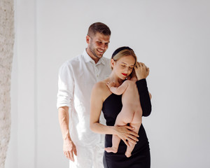 Happy Young Family in Studio