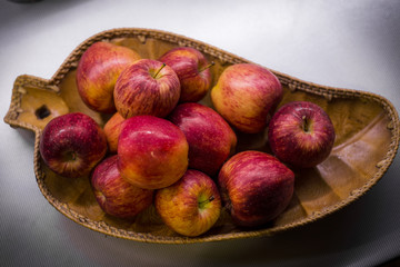 washed apples are on a plate