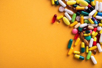 Group of colored vitamins and pills