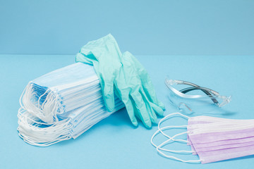 Latex gloves, masks and safety glasses for personal protection.